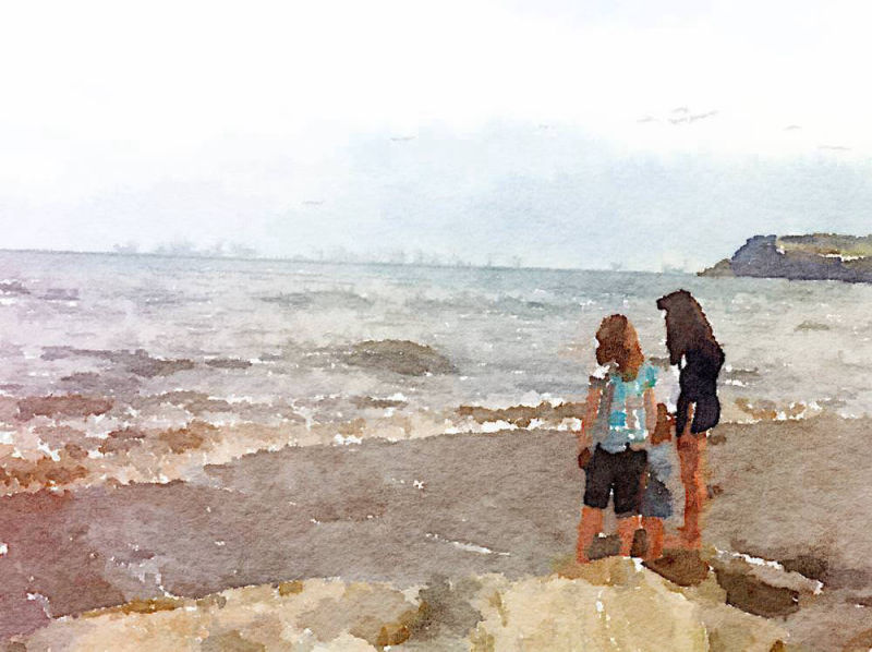 Children on the beach in watercolours